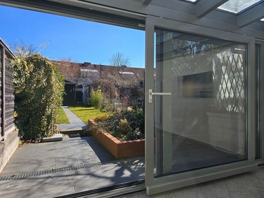 Wintergarten mit Schiebetür