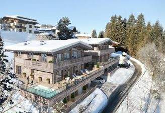 Zwei trendige Chalets in Toplage