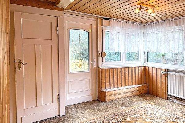 Veranda mit Aussicht in den Garten