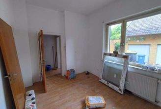 Wohnung im Erdgeschoss Zimmer 1