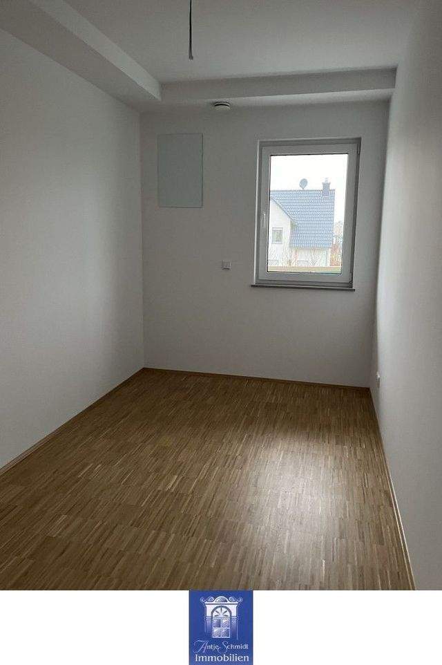 Gemütliche und hochwertige Neubauwohnung mit Balkon, EBK und Fußbodenheizung! - Photo 2