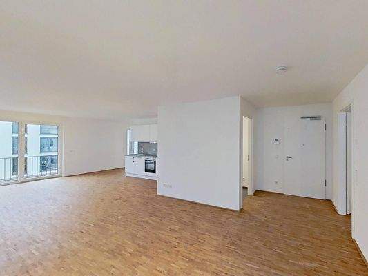 Ansicht III: Wohn- und Esszimmer mit offenem Küchenbereich