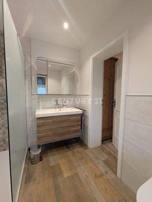 Modernisiertes Bad en Suite im EG