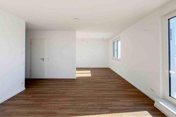 Wohnzimmer mit Blick in die Küche