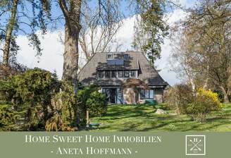 Hübsches Einfamilienhaus mit parkähnlichem Garten
