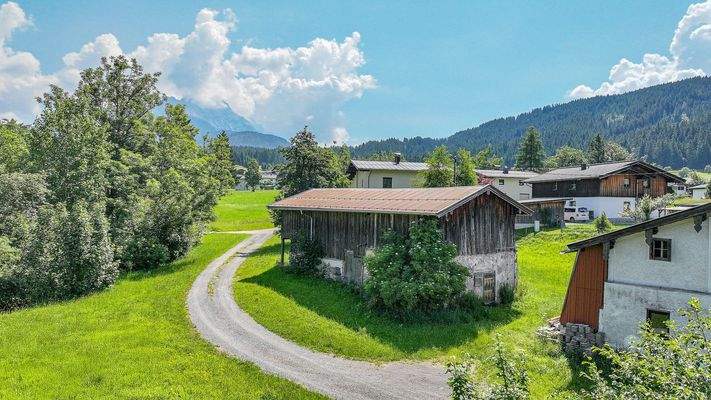 KITZIMMO-Baugrundstück mit Planung für ein Einfamilienhaus - Immobilien Hochfilzen.