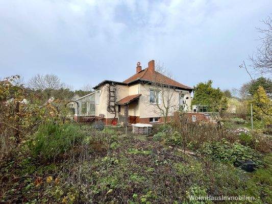 Ein kleines Haus mit Garten teilbar