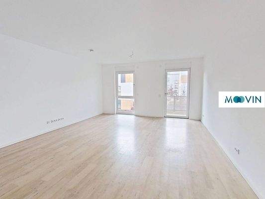 Ansicht II: Wohn - und Esszimmer mit offener Küche