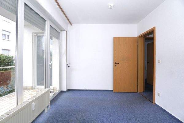 Schlafzimmer mit Balkonzugang