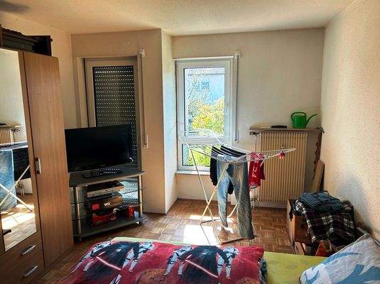 Schlafzimmer mit Balkonzugang