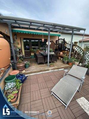 Überdachte Terrasse Wohnung