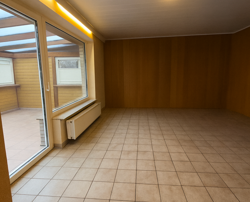 Wohnbereich mit Blick auf Wintergarten 