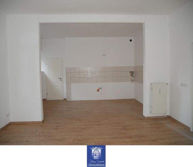Ihre perfekte Familienwohnung mit Balkon und Blick ins Grüne in sehr schöner Lage! - Foto 1