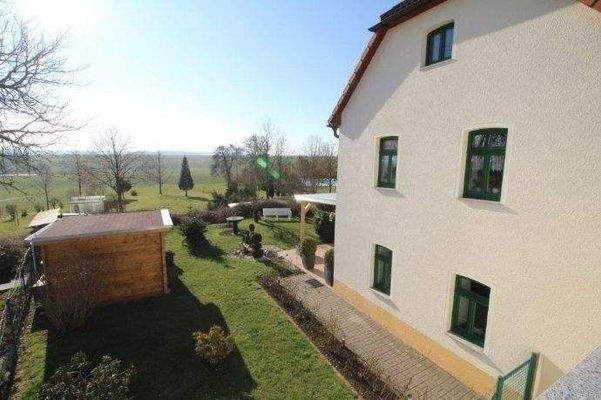 Blick von der Dachterrasse in den Garten- Süden