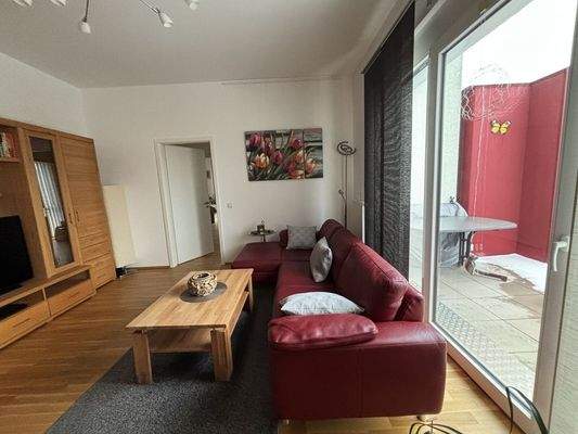 Wohnzimmer mit Balkon