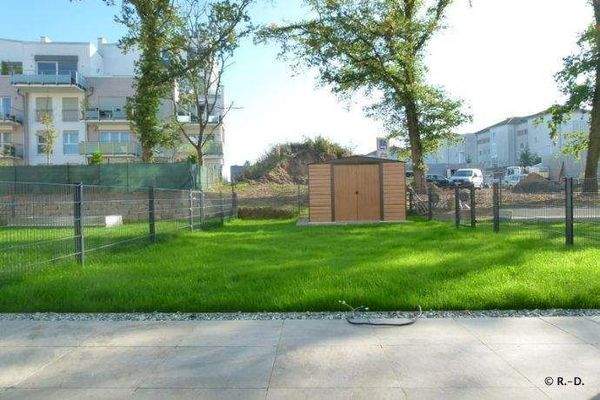 Blick von der Küche zum eigenen Gartenbereich