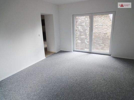 Wohnzimmer mit Balkon 1.OG