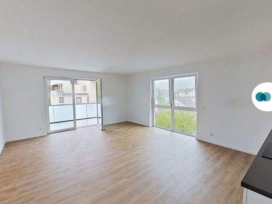 Ansicht I: Wohn- und Esszimmer mit offenem Küchenbereich