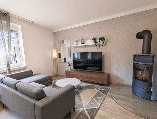 Wohnzimmer mit Kamin