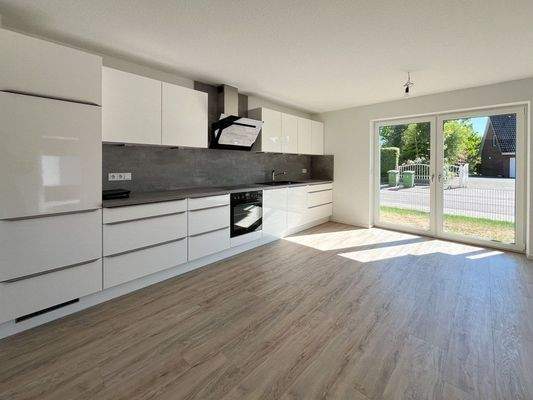 Wohnzimmer mit EInbauküche