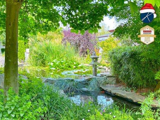 Traumgarten mit Koi-Teich und Wasserspielen