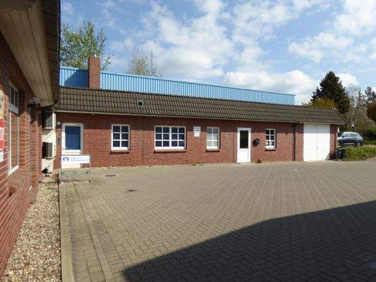 Flachbau mit Wohnung  bzw. weiterem Gewerberaum