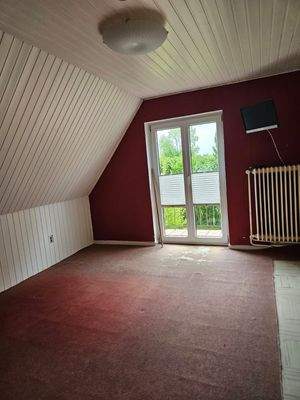 Schlafzimmer im OG mit Balkon