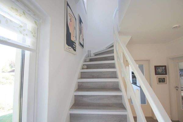 Original Holztreppe mit hochwertiger Renovierung