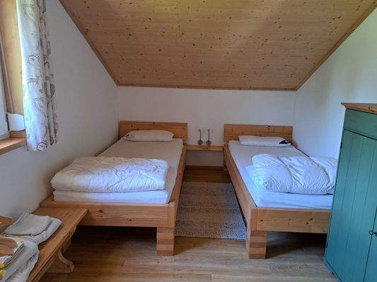 Zimmer mit zwei Einzelbetten