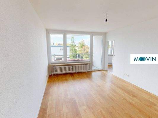 Ansicht II: Wohnzimmer mit Zugang zum Balkon