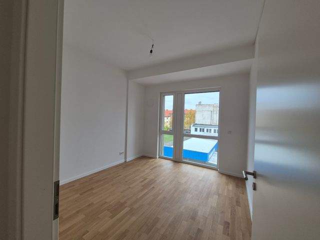 Schicke 2-Zimmer mit Parkett, Balkon, Einbauküche, Fußbodenheizung u. Stellplatz - Photo 2