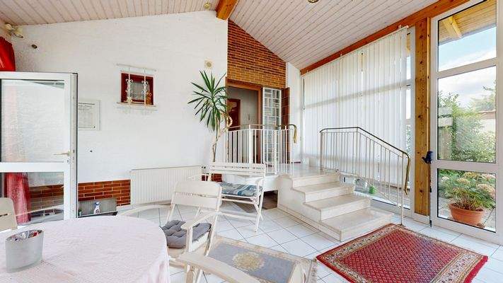 Wintergarten mit Kamin 