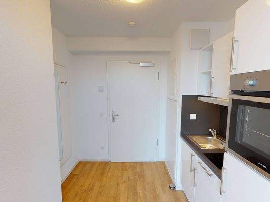 Ansicht III: Eingangs- und Küchenbereich