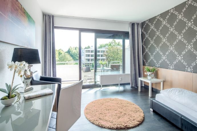 Exclusive Living - One-Room Design Appartment Provence Typ 33mit Loggia im salinenparc Bad Westernko