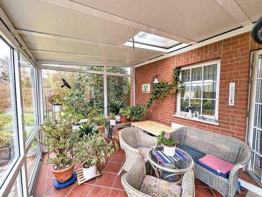 makellos 20 EFH Neu Broderstorf - Wintergarten.jpg