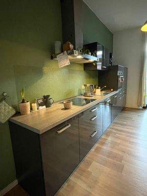 Küche mit Einbauküche 