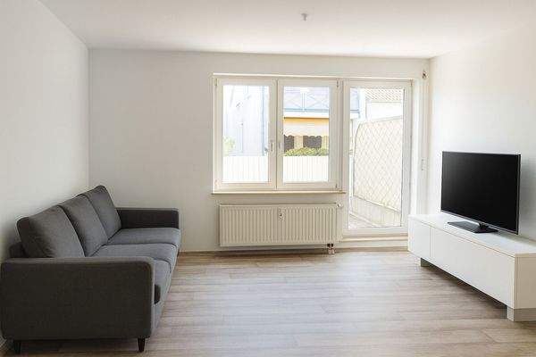 Wohnraum der Wohnung, mit Zugang Terrasse