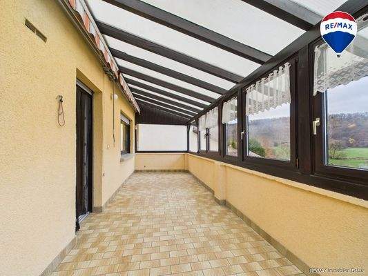 RE/MAX Immobilien DeLux Zweifamilienhaus Wadern-Lockweiler Wintergarten