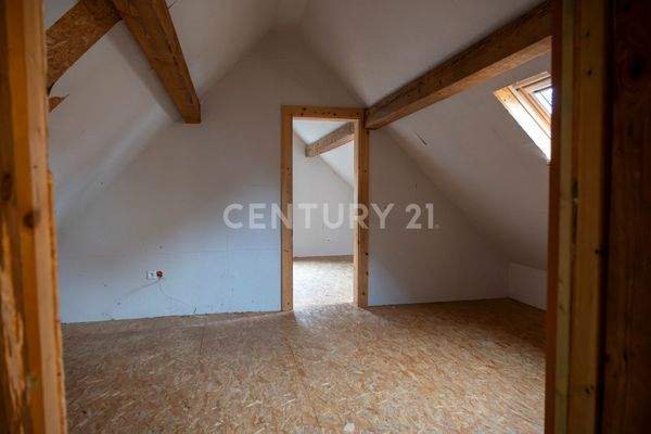 Schlafzimmer mit Ankleidezimmer oder Büro