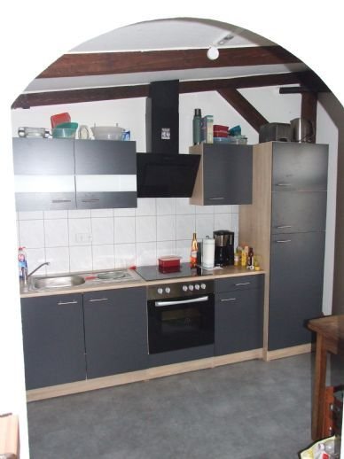 Moderne Wohnen - offen mit Sichtdachstuhl -Einbauküche