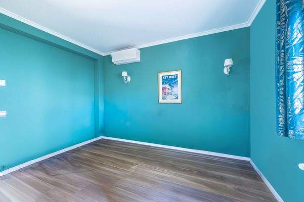 Guest bedroom in villa in Palmanova