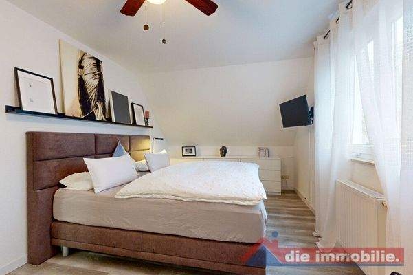 Ruhiges Schlafzimmer mit Wohlfühlcharakter