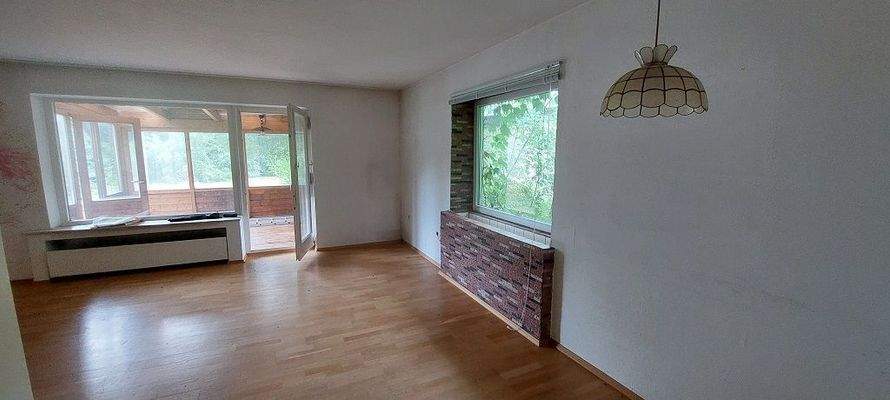 Wohnzimmer mit Wintergarten