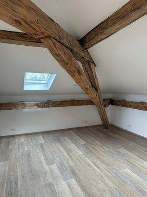 Loftbüro mit Holzbalken