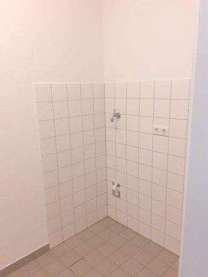 Abstellraum mit Waschmaschinenanschluss