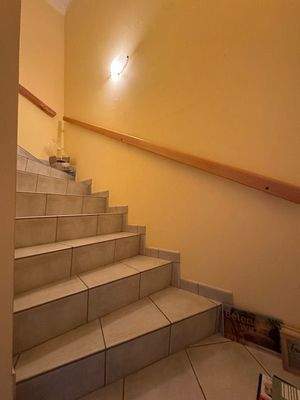 Treppe ins ausgebaute Dachgeschoss