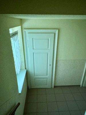 Abstellraum auf halber Treppe