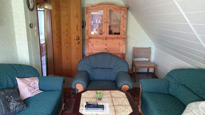 Wohnzimmer obere Wohnung