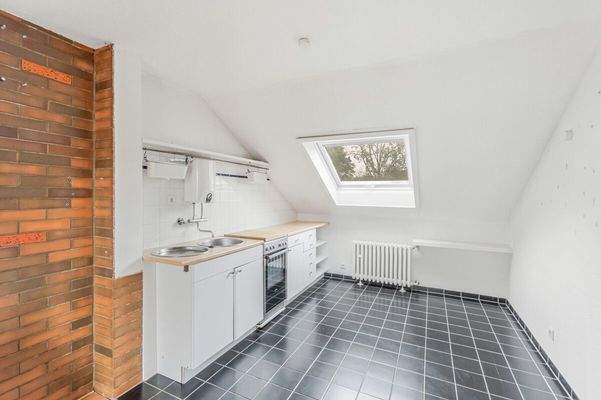 Gefliester Küchenbereich im Apartment