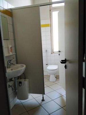 je ein WC für Damen und Herren